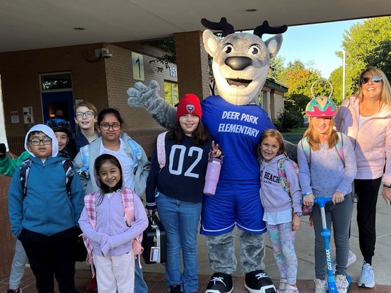 students, teacher and mascot on walk to school day