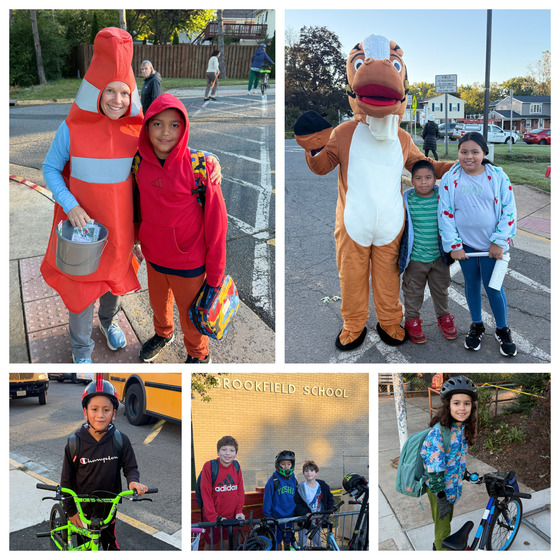 Teacher in a cone costume and Horse costume with students walking and on bikes