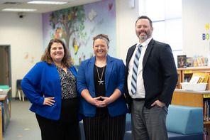 Three Administrators Standing in Library