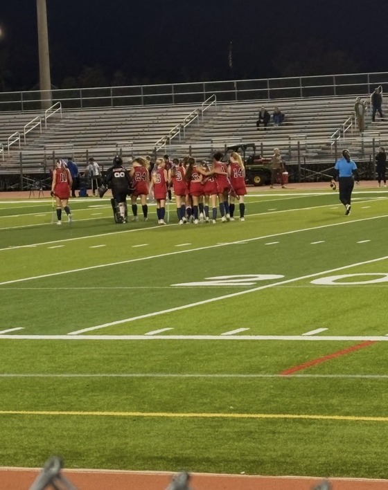 Students standing on the field