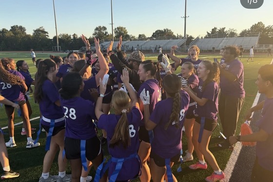 Students cheering in the field