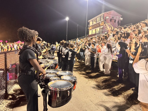 drumline in front of the student section