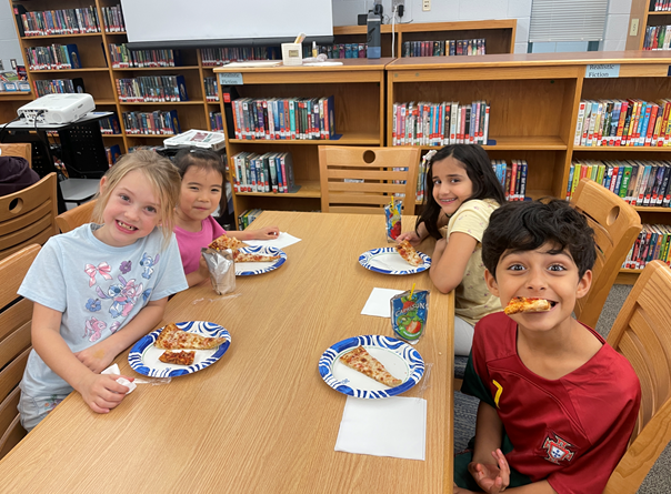 4 students participating in the CARES Pizza lunch