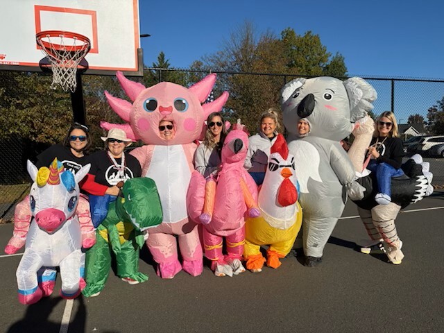 Picture of teachers dressed in costumes