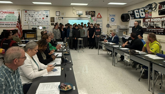 Participants at a classroom meeting