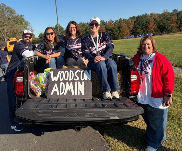 Woodson High School AP's standing at HOCO parade