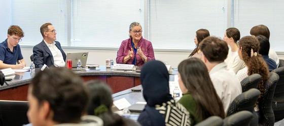 Dr. Reid with student journalists
