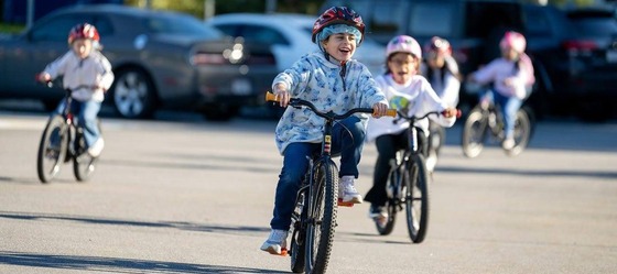 students riding bikes