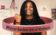 Student at Patriot HS wearing bracelet in support of Random Acts of Kindness Week