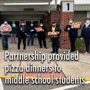 Community partnership provides pizza meals to middle school students