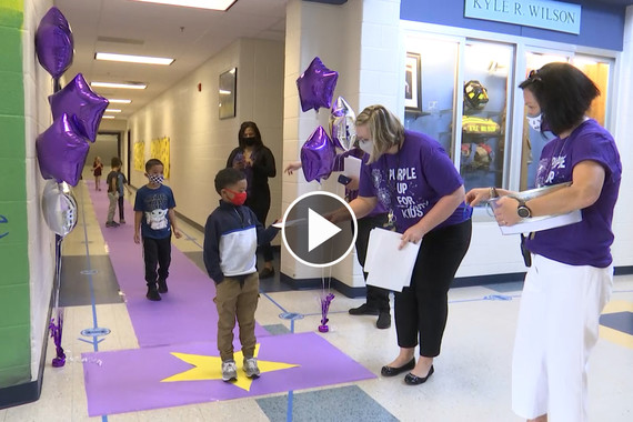 Purple walk of fame celebrates military students at Kyle Wilson Elementary School 