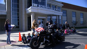 Students deliver hand-made cards to veterans during American Legion bike parade at The Nokesville School. 