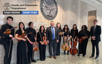 Osbourn Park High School orchestra students perform for U.S. Secretary of Education and other officials