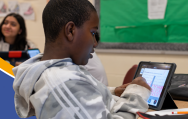 student on ipad