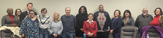 Group photo of Homelessness Task Force members, partners, and city staff gathered for the last meeting of 2023