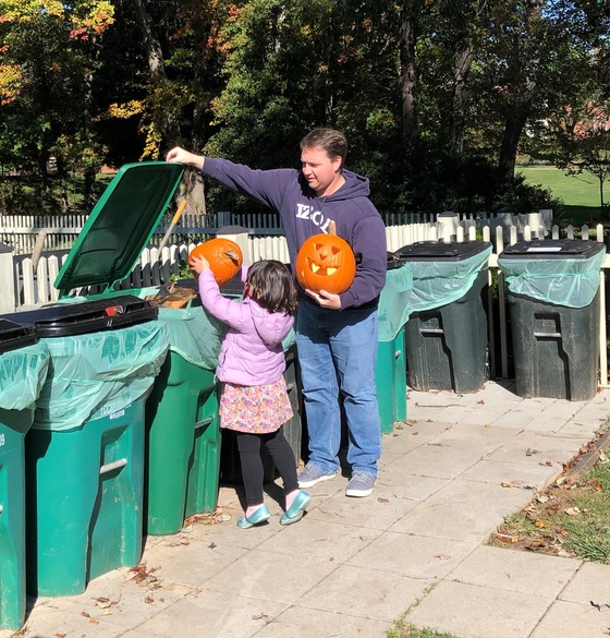 Father Daughter Pumpkin Composting