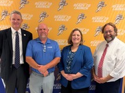 photo of school board member kristina cecere with katherine johnson ms principal chris smith and superintendent dustin wright