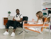 man counseling young girl 