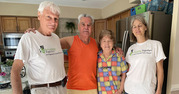 photo of staff and volunteer- rebuilding together