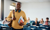 older man in higher education classroom