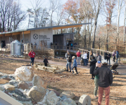 Image of the outside of the new Woodlands Stewardship Education Center. 