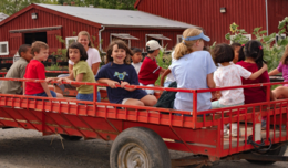 Kids on a red wagon ride