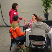 Volunteers talking with each other 