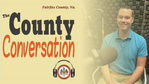 county conversation logo with Kevin Smith's photo in the studio