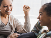 photo of mother and daughter talking 