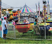 Image of children on carnival rides