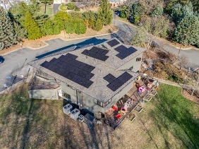 aerial view of solar panels on a roof
