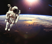 Image of an astronaut floating in space above Earth. 