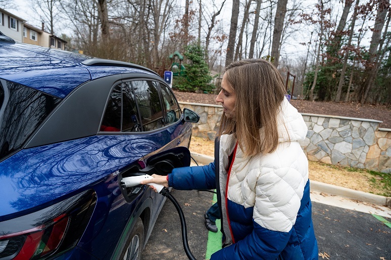julie plugging in her EV