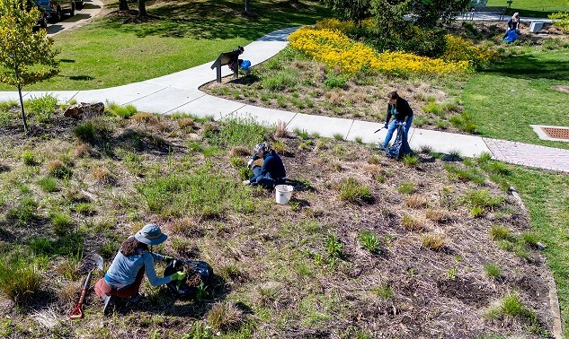 FEEE members doing landscaping volunteer work