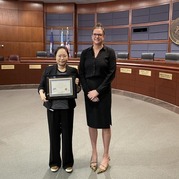 photo of Chi Sook receiving award