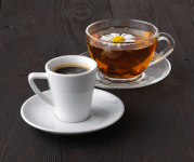 Image of a mug of coffee and a mug of tea.