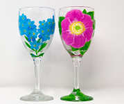 Image of wine glasses painted with flower designs.