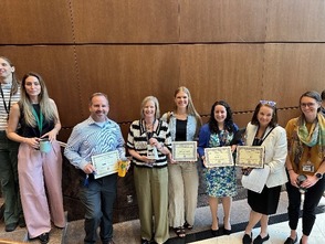 photo of OEEC staff with their awards
