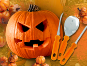 carved pumpkin and tools