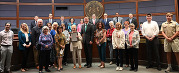 photo of Elaine Miletta and county staff