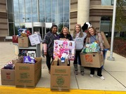 Adopt A Family staff with donations