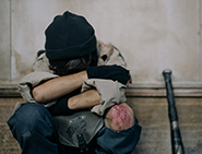 boy with his head down