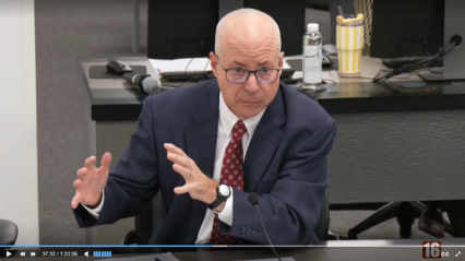 screenshot of John Morrill presenting to the board