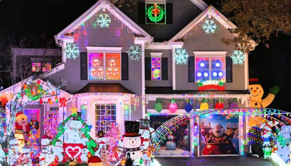 The Oakton Park Lights family's house decorated in bright Christmas lights. 