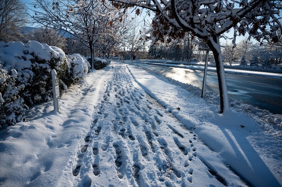 Winter Snow on Sidewalk