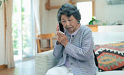 older woman on the phone