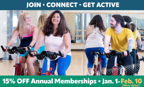 People ride stationary bikes.