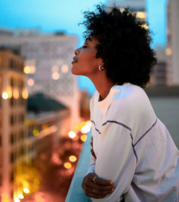 woman standing on balcony