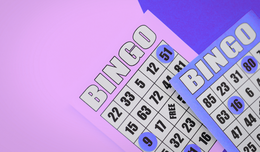 Bingo sheets with numbers marked. 