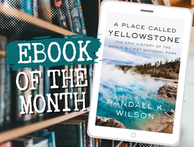Tablet displaying the ebook “A Place Called Yellowstone” beside text reading “Ebook of the Month” against a bookshelf background.